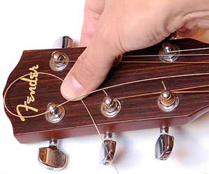 How to string a guitar image 2